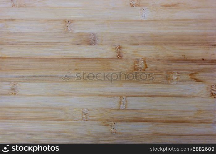 Natural Wooden Desk Texture, Top View. Kitchen cutting board made from bamboo