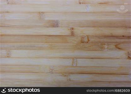 Natural Wooden Desk Texture, Top View. Kitchen cutting board made from bamboo