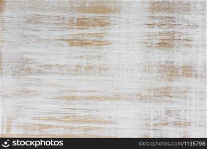 Natural wooden oak surface poorly painted with white paint