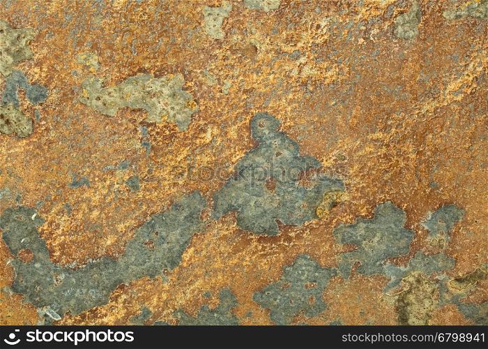 Natural yellow and gray patterned slate surface for background