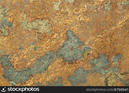 Natural yellow and gray patterned slate surface for background