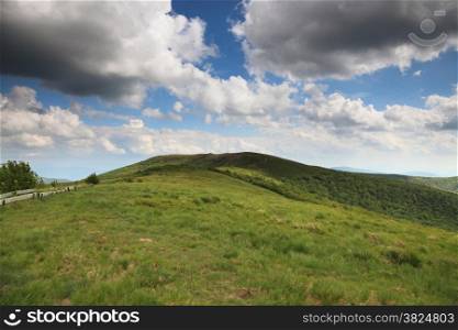 Nature and environment. Beautiful green hills. Mountain landscape in the summer. Travel and tourism.