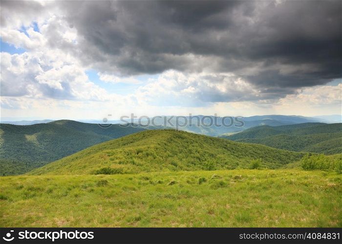 Nature and environment. Beautiful green hills. Mountain landscape in the summer. Travel and tourism.