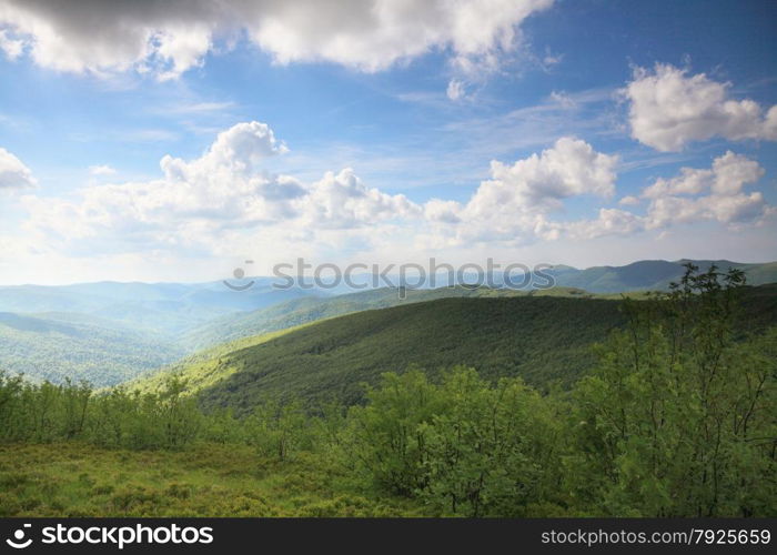 Nature and environment. Beautiful green hills. Mountain landscape in the summer. Travel and tourism.