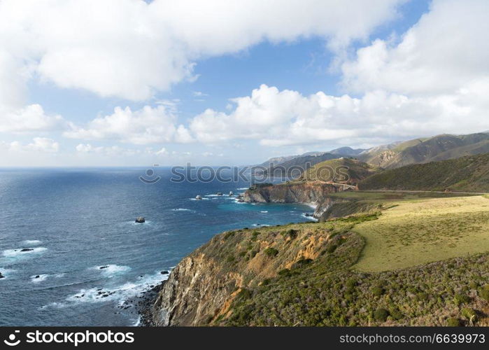 nature and landscape concept - beautiful view of big sur coast in california and bixby creek bridge. beautiful view of big sur coast in california