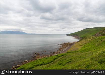 nature and landscape concept - view to ocean at wild atlantic way in ireland. view to ocean at wild atlantic way in ireland