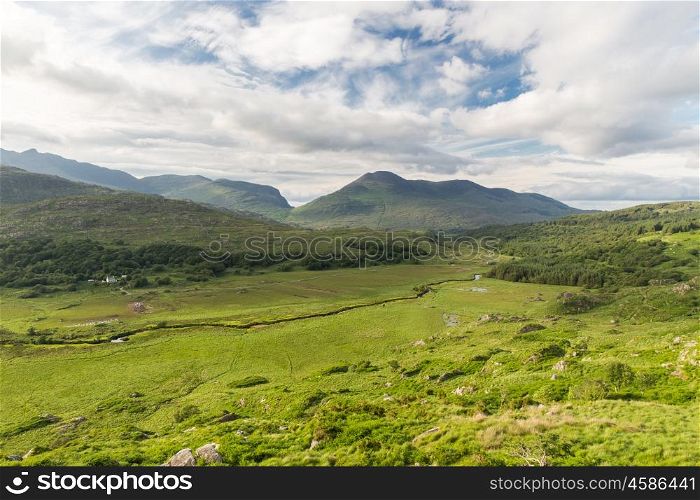 nature and landscape concept - view to plain with lake or river at Killarney National Park valley in ireland. river at Killarney National Park valley in ireland