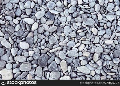 Nature background from gray sea pebbles