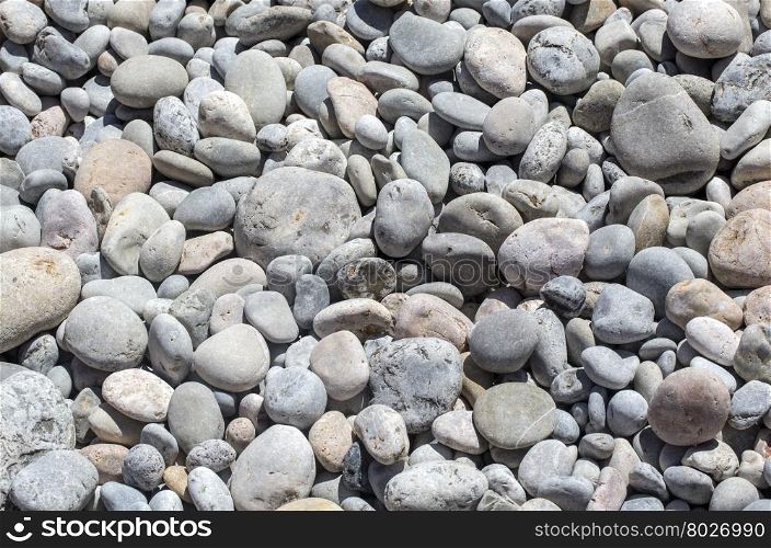 Nature background from gray sea pebbles