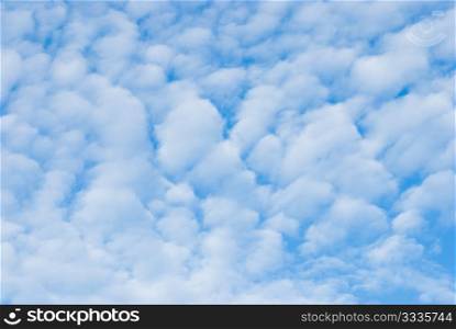 nature background. special white clouds over blue sky