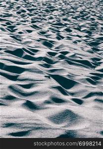 Nature concept. Beach or desert sand as a background, copy space.. Beach sand as a background.