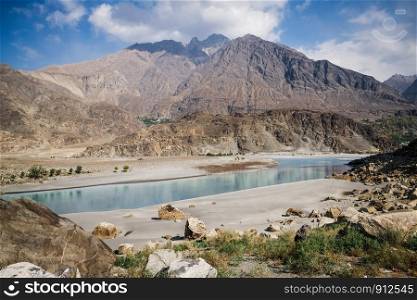 Nature landscape view of mountains and clear water of river at Ghanche district. Gilgit Baltistan, Pakistan.