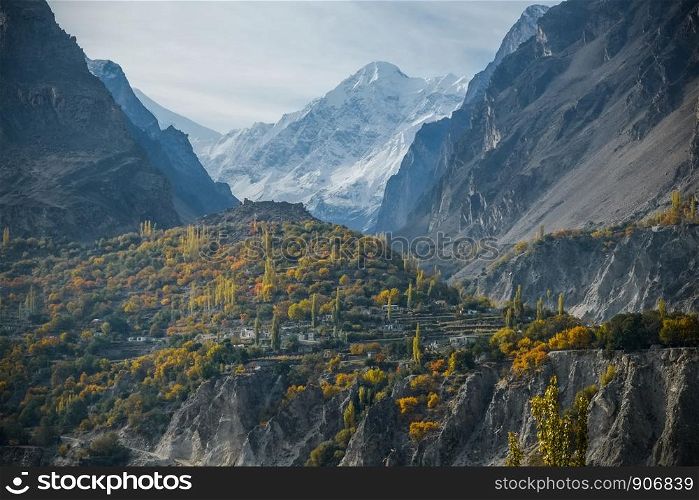 Nature landscape view of snow capped mountain peak in the Karakoram range in Nagar Valley. Autumn season in Gilgit Baltistan, Pakistan.