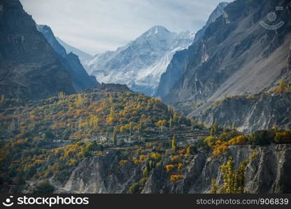 Nature landscape view of snow capped mountain peak in the Karakoram range in Nagar Valley. Autumn season in Gilgit Baltistan, Pakistan.