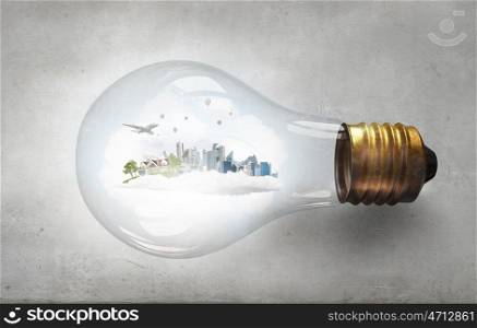 Nature mechanisms. Glass light bulb with green life concept inside