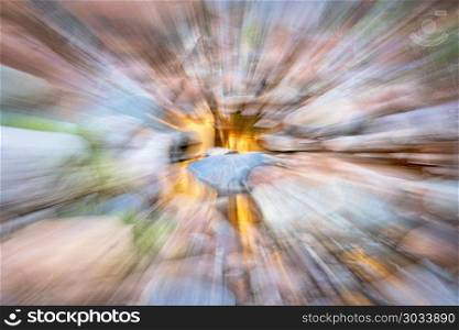 nature motion blur abstract. nature motion blur abstract in pastel colors - sandstone canyon with green vegetation