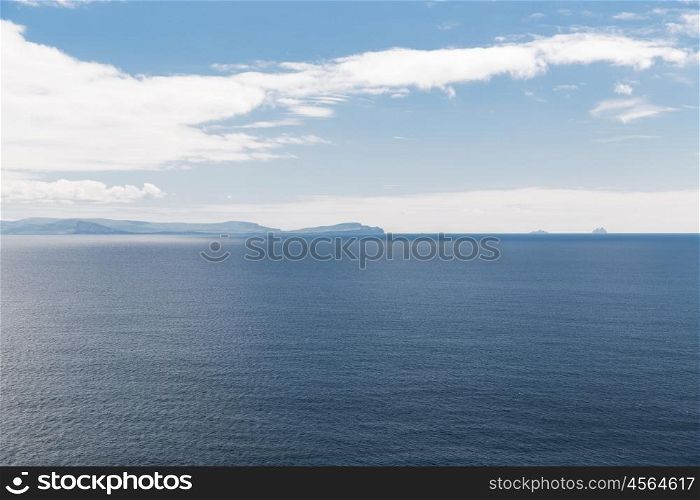 nature, seascape and landscape concept - view to ocean at wild atlantic way in ireland