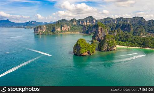 nature seascape island and mountain green forest and beautiful sand beach at ao nang rairay tourist attractions province krabi Thailand aerial view from drone camera