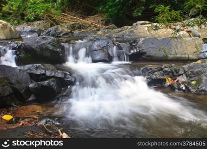 Nature waterfall in deep forest, in national park Thailand