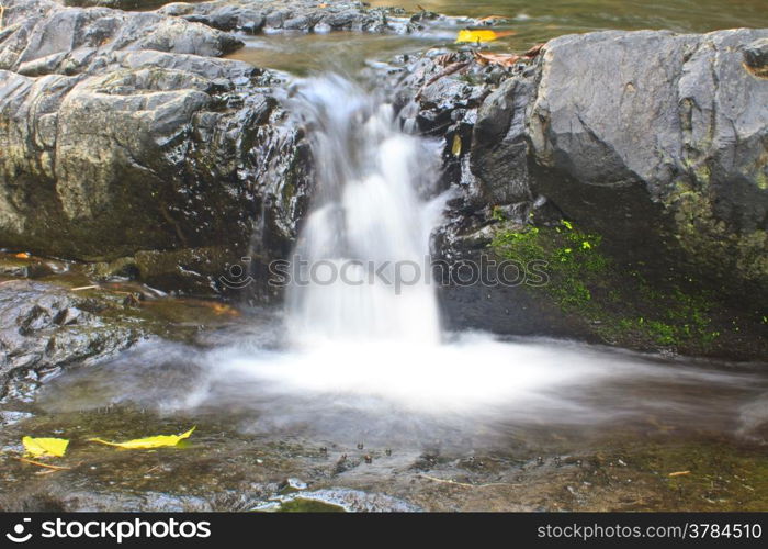 Nature waterfall in deep forest, in national park Thailand