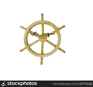 Nautical steering wheel made of wood with a hammock strung between a couple of the spokes