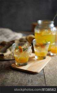 Navel orange cocktail with rosemary. 