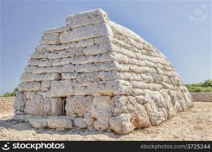 Naveta des Tudons - ancient megalithic chamber tomb at Menorca island; Spain. It served as collective ossuary between 1200 and 750 BC and represet one of the oldest ancient structures in Europe.