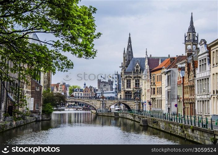 Navigating one of the canals of the Belgian city as it passes through the center of the city