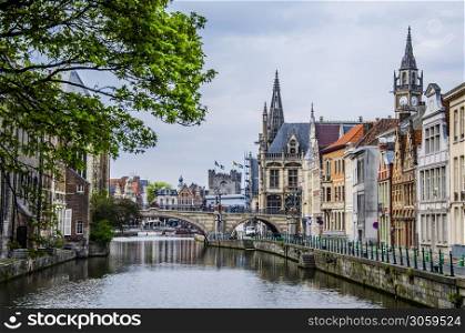 Navigating one of the canals of the Belgian city as it passes through the center of the city