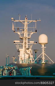 navigation equipment on the mast of a large ocean liner