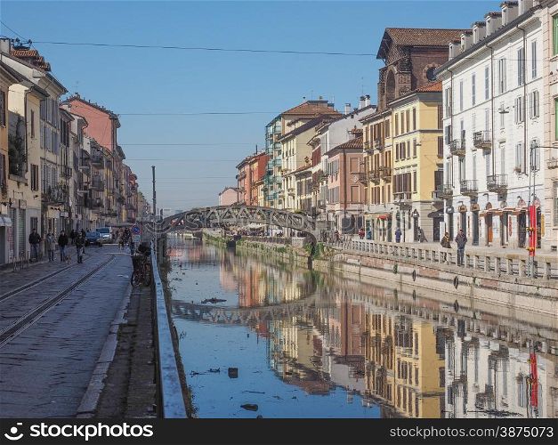 Naviglio Grande Milan. MILAN, ITALY - MARCH 28, 2015: Tourists at the Naviglio Grande canal waterway in Milan Italy