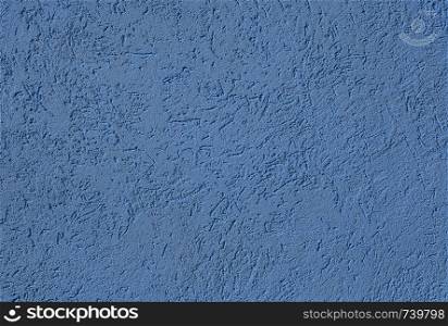Navy Blue Textured cement or concrete wall background. Deep focus. Mock up or template for modern design.. Textured cement or concrete wall background. Deep focus. Mock up or template.