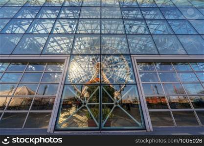 Navy pier ferris wheel reflection with windows glasses at the sunset time,Illinois, United States, USA, Business Architecture and building with tourist concept