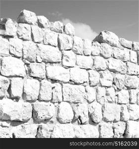 near house and block building abstract background in oman the old wall