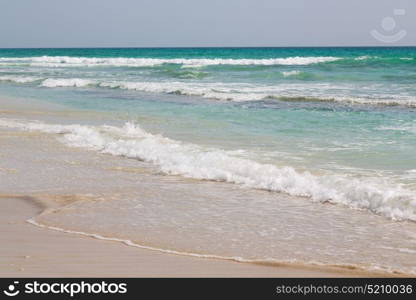 near sandy beach sky and mountain in oman arabic sea