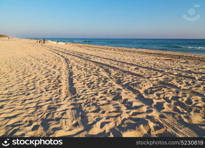 near sandy beach sky and mountain in oman arabic sea