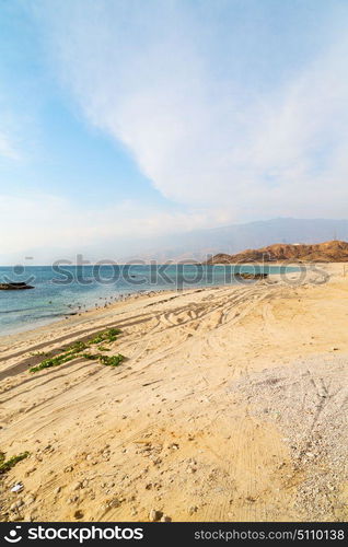 near sandy beach sky and mountain in oman arabic sea the hill