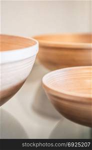 Neat and simple design natural color wooden bamboo bowls close up shot