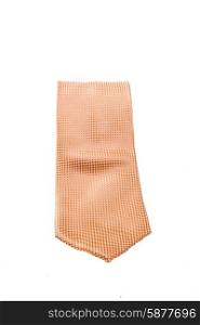 Neatly roled up tie of a peach colour, with point of tie facing forward, on a white background.