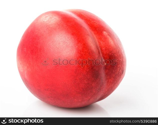 Nectarine fruit close up on white background