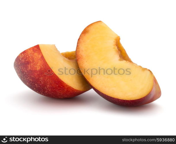 Nectarine fruit slice isolated on white background close up