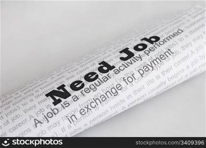 Need Job conception.Text Need Job written on paper