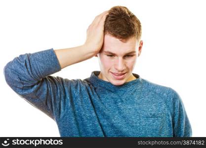 Negative human emotions, facial expressions, reaction attitude. Closeup stressed man holding head with hands isolated