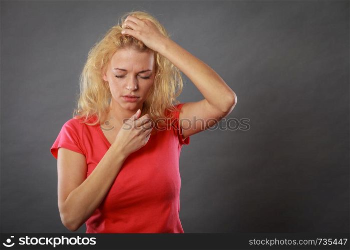 Negative human emotions, headache, face expressions, mental disorders concept. Stressed, frustrated, depressed young woman in pain holding her head and hair. Stressed, frustrated, depressed young woman in pain