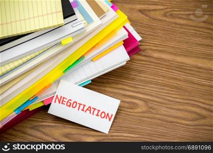 Negotiation; The Pile of Business Documents on the Desk