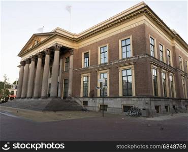 neo classical old courthouse in leeuwarden, capital of the dutch province of Friesland in warm morning light