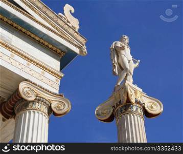 Neoclassical statue of ancient Greek god, Apollo, outside Academy of Athens, Greece. Apollo was the god of light and the sun, truth and prophecy, archery, medicine and healing, music, poetry and the arts.