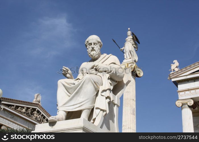 Neoclassical statues of ancient Greek philosopher Plato and goddess Athena outside the Academy of Athens. One of the major landmarks of Athens, Greece.