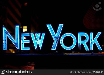 Neon sign glowing at night, Times Square, Manhattan, New York City, New York State, USA