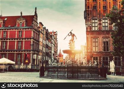 Neptune statue and fountain and Old Town architecture in Gdansk, Poland. Neptune statue and Old Town architecture in Gdansk.